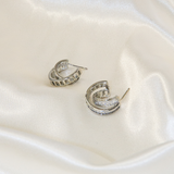 TWISTED SILVER HOOPS J74E03