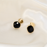 BLACK GLOW STUDS J74D08