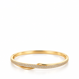 ADRIANA DIAMANTE TWIST GOLD BANGLE