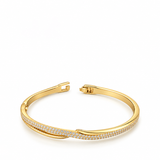 ADRIANA DIAMANTE TWIST GOLD BANGLE